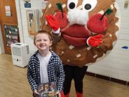 Pie mascot and Ty Tidwell