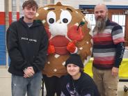 Pie mascot and Lewis Family