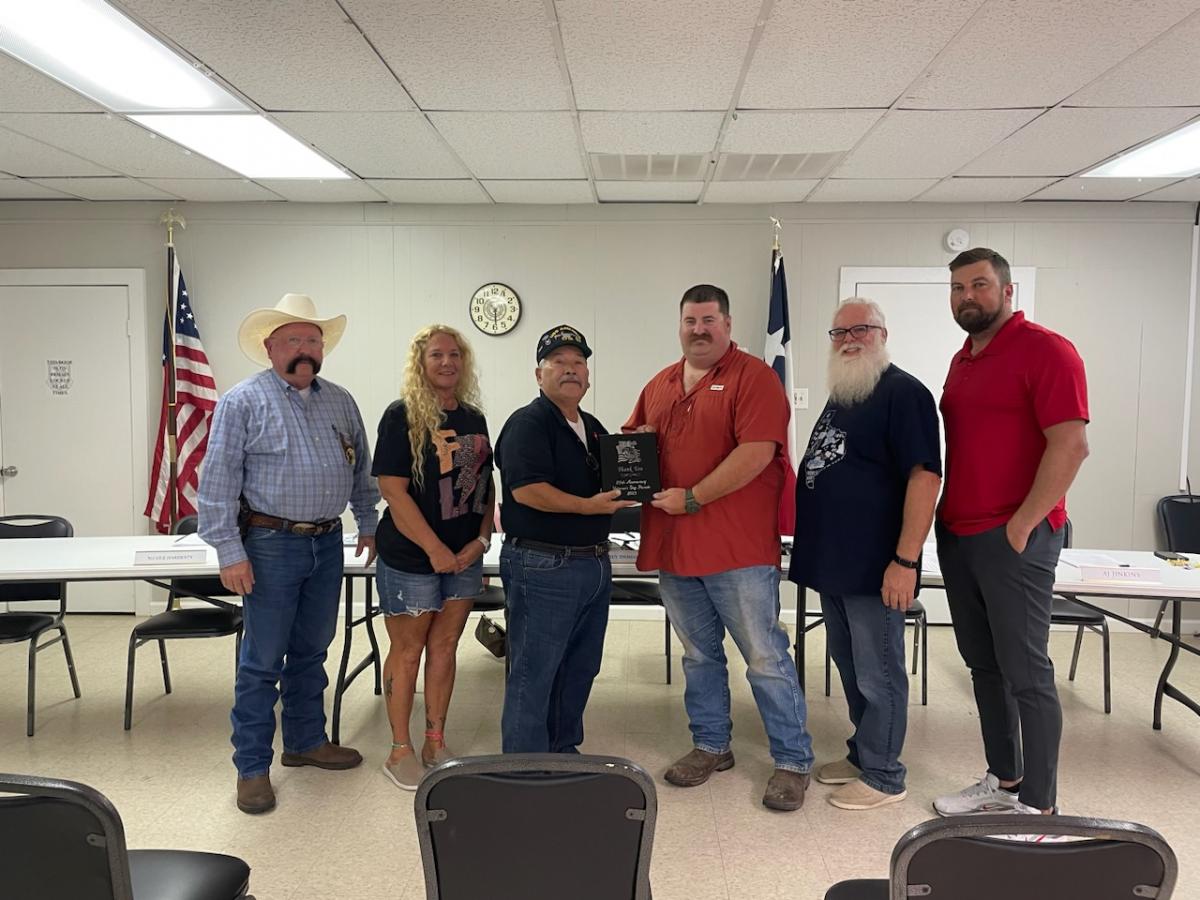 City Coucil accepting Plaque